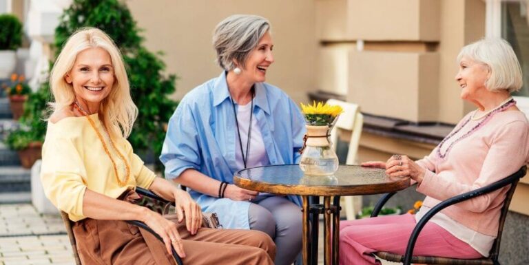 Elderly Residents Socializing Outdoors of Assisted Living Community