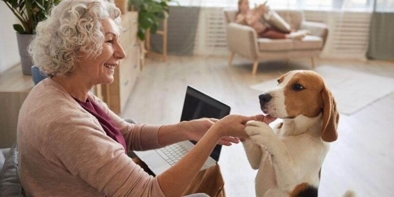 Elderly Woman Bonding with Therapy Dog at Assisted Living Facility