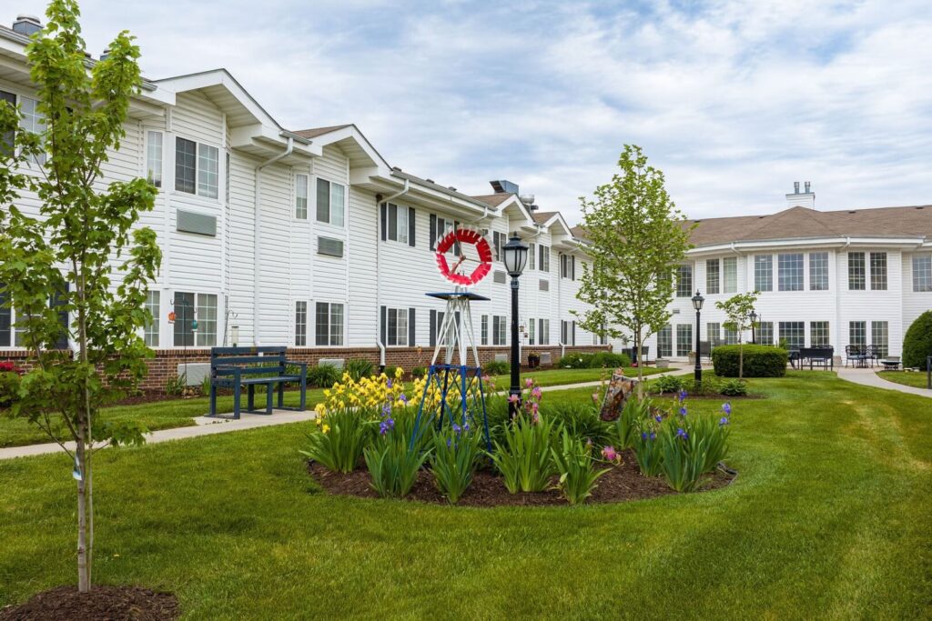 Spring Flower Garden with Decorative Windmill at Assisted Living Facility