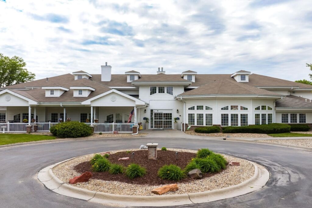 Front Entrance and Circular Driveway with Covered Porch at Assisted Living Community